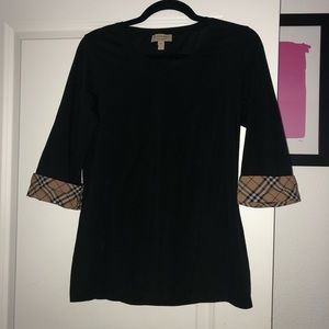 Burberry top never worn.